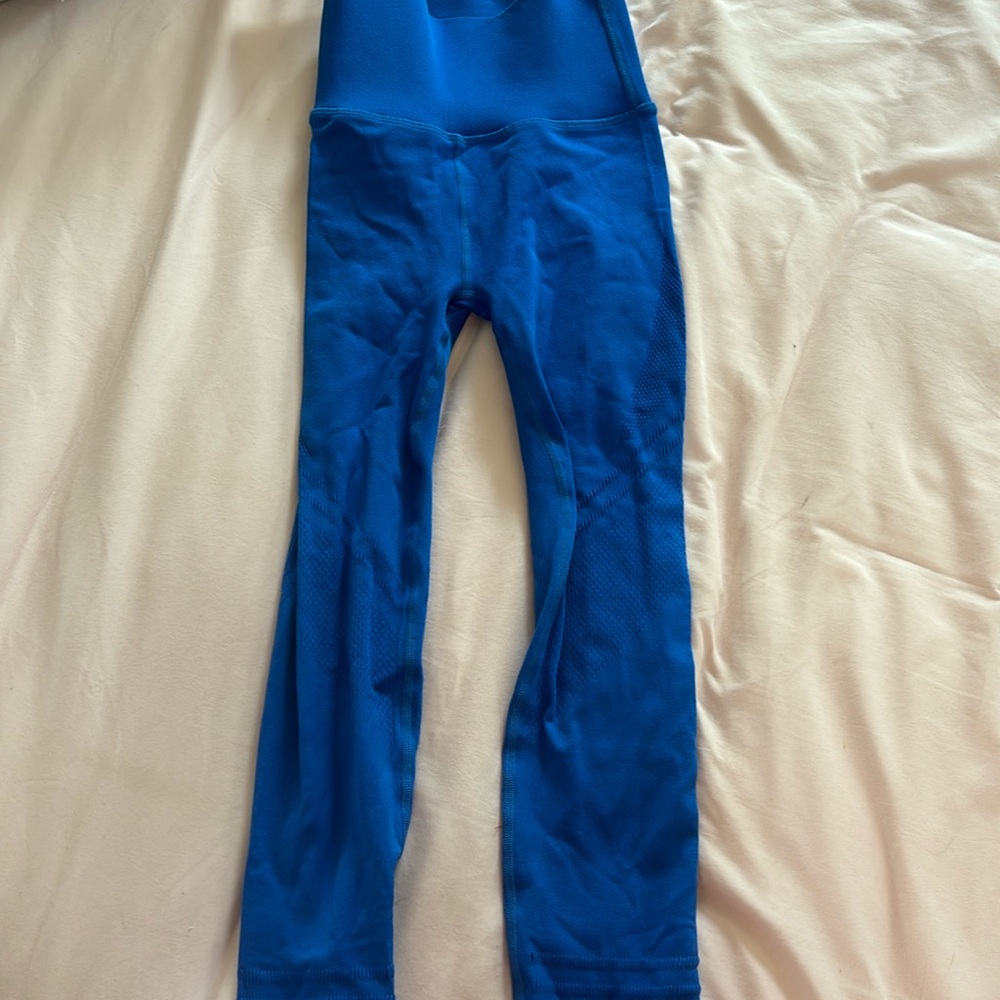 Blue fable-tics leggings, small.They appear very tiny but they stretch a lot.